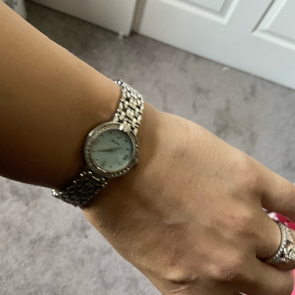 Bulova women’s watch with diamonds around face - Picture 9 of 9